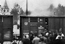 Погрузка людей в грузовые вагоны. Рига, 1941 г. 220px-Latvia_deportation_1941